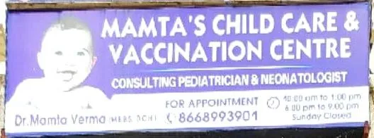 The purple signboard reading Mamta's Child Care & Vaccination Centre, Consulting Pediatrician & Neonatologist